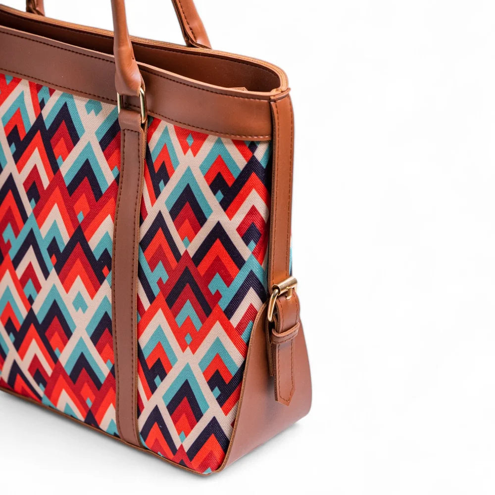 Canvas Tote Bags - Tote bag with geometric pattern and brown leather accents on a white background