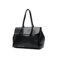 A black faux-leather handbag with a structured shape, double top handles, and a front flap, shown on a plain white background. Bag by HBH