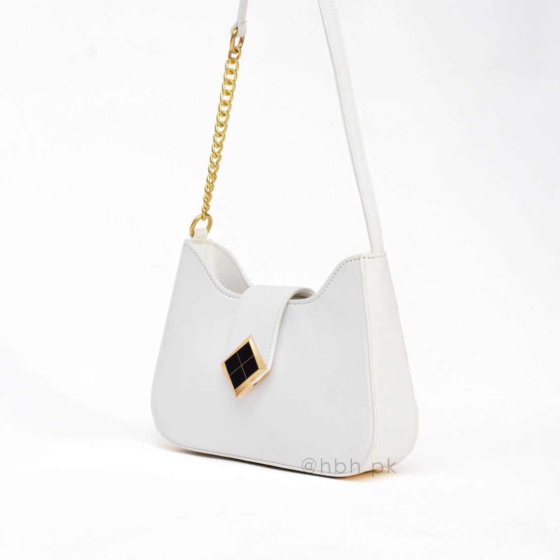 White handbag with a gold chain on a white background