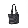 Checkered handbag with black straps on a white background